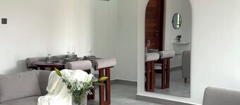 Canaan Residence near Mlimani City shopping mall. Cozy and Clean family home.