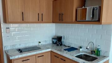 Deluxe Apartment, Kitchen, Beach View | Private kitchen