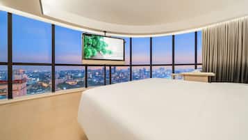 Habitación ejecutiva doble, vistas a la ciudad | Caja fuerte, escritorio, cortinas opacas y wifi gratis