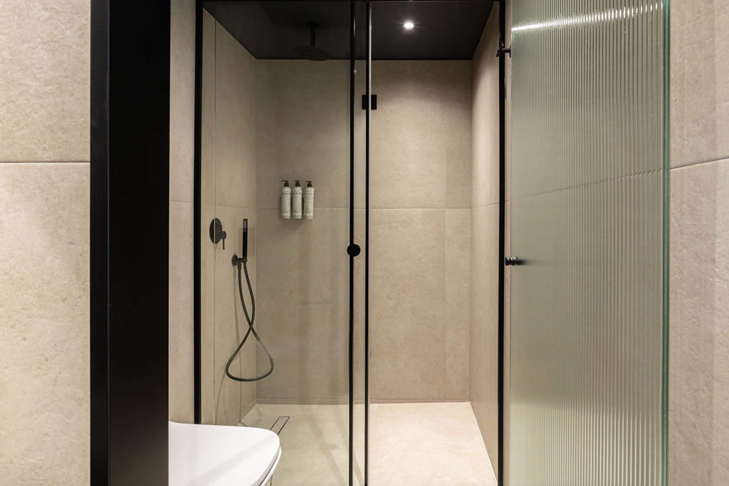 Suite | Bathroom | Hair dryer, towels