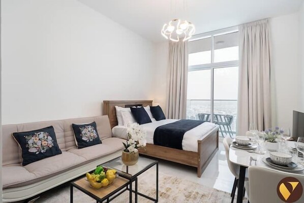 Lyxstudio - balkong - utsikt mot trädgården