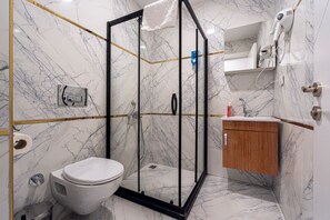 Comfort kamer, uitzicht op stad | Badkamer