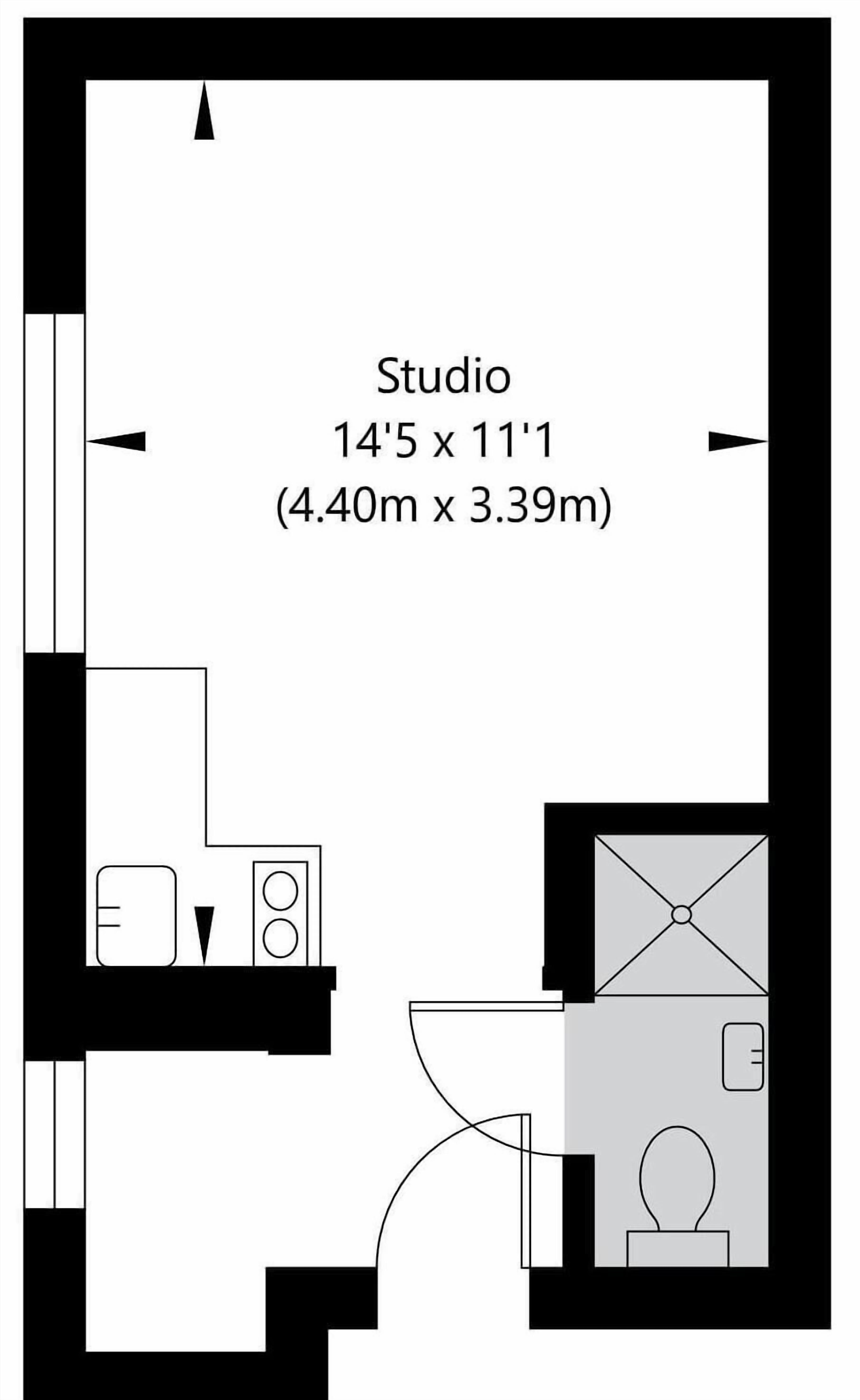 En ettrumslägenhet med måtten 4,40 m x 3,39 m (14 fot 5 tum x 11 fot 1 tum), inklusive ett litet kök, ett badrum och en liten sittgrupp.