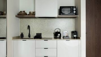 Fridge, microwave, coffee/tea maker, toaster