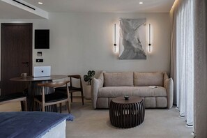 TV, offices - Deluxe Suite with Balcony by MonCasa (Agios Nikolaos)