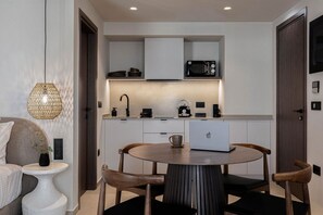 Fridge, microwave, coffee/tea maker, toaster - Deluxe Suite with Balcony by MonCasa (Agios Nikolaos)