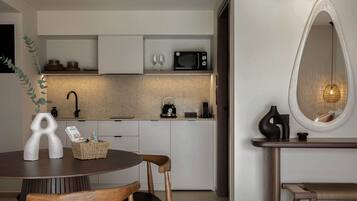 Fridge, microwave, coffee/tea maker, toaster