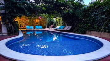 Seasonal outdoor pool, open 8:00 AM to 9:00 PM, sun loungers