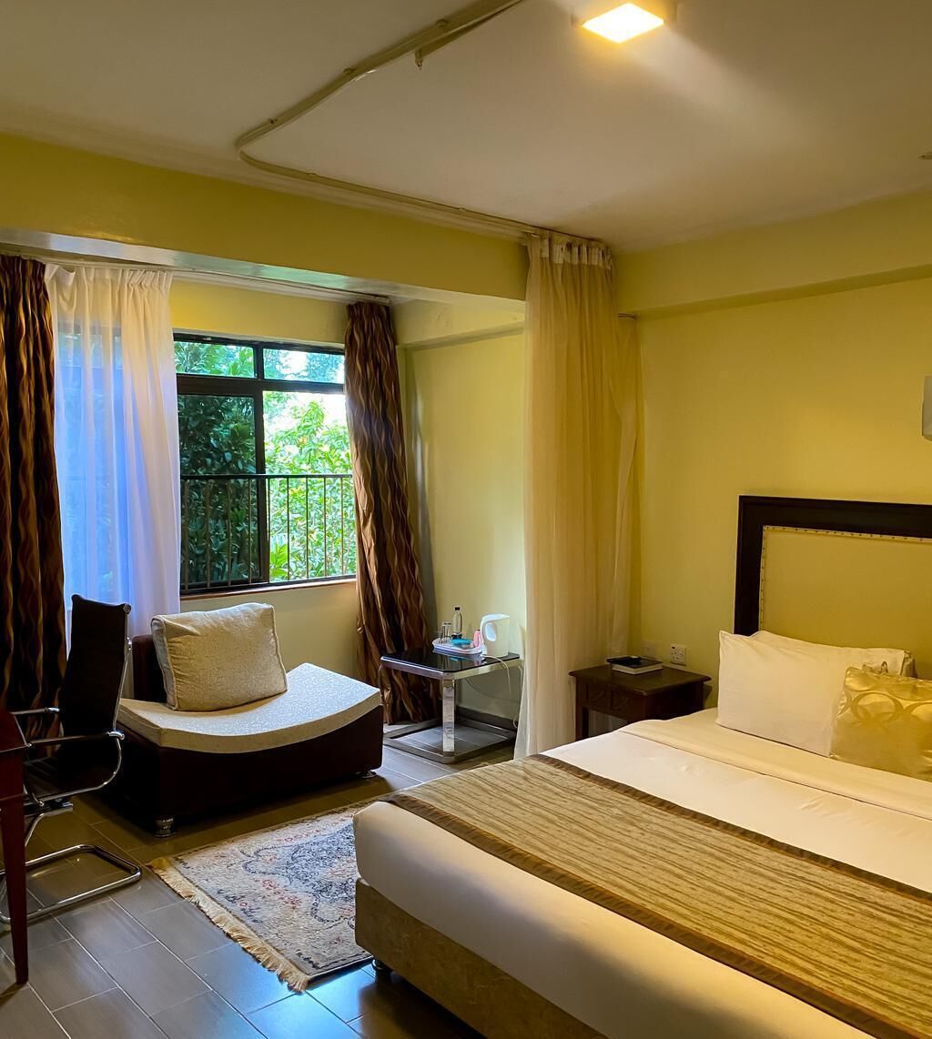 Chambre Standard double, vue sur le jardin | Coffre-fort, rideaux d’obscurcissement, système d’insonorisation