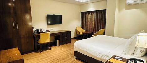 Superior Double Room, City View | In-room safe, desk, laptop workspace, blackout drapes