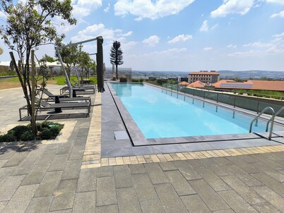 Ellipse Waterfall ~ Power & Water Backup free WiFi, next to Mall of Africa