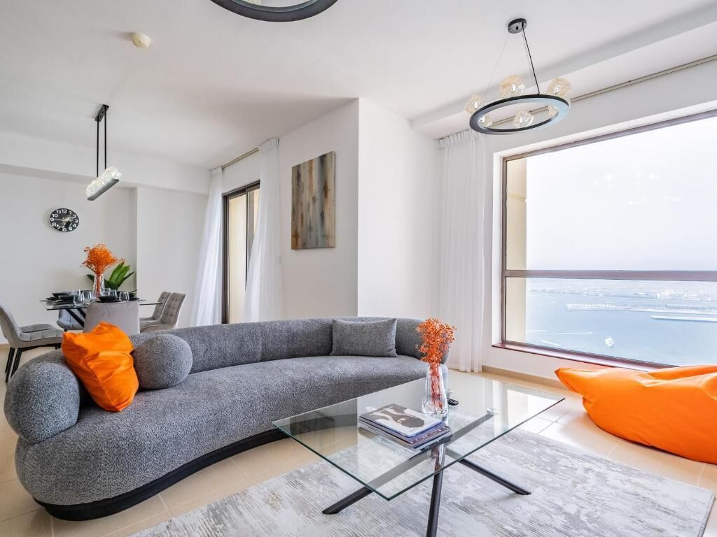 Apartment, Balcony, Sea View | Living area | Flat-screen TV