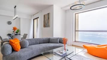 Apartment, Balcony, Sea View | Living area | Flat-screen TV