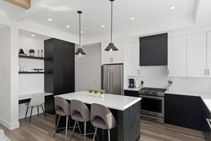 Private kitchen - Luxury 4-bed, 3.5-bath home in Shelter Bay, West Kelowna. High-end finishings, rooftop deck with hot tub and full Okanagan Lake views, plus private beach access. Minutes to downtown, wineries, and outdoor adventures. (West Kelowna)