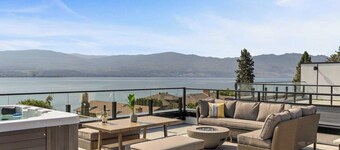 Luxury 4-bed, 3.5-bath home in Shelter Bay, West Kelowna. High-end finishings, rooftop deck with hot tub and full Okanagan Lake views, plus private beach access. Minutes to downtown, wineries, and outdoor adventures.