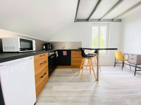 Private kitchen. Le Belle Vue St Marcel with shared garden