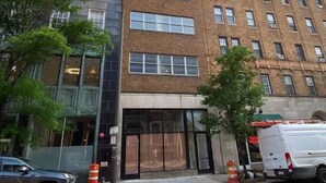 A multi-story building with a brick facade, large windows, and a modern entrance. - Spacious Center City 2BR 2Bath Apt. with Balcony (Philadelphia)