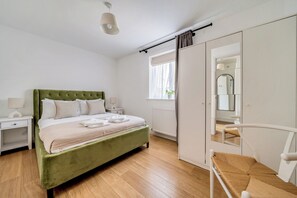 2 slaapkamers, een strijkplank/strijkijzer, gratis wifi, beddengoed