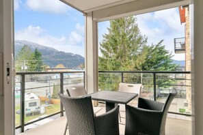 Outdoor dining - Elevated Escapes: 2BR Overlooking Mountain View! (Harrison Hot Springs)