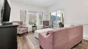 TV, fireplace - Elevated Escapes: 2BR Overlooking Mountain View! (Harrison Hot Springs)