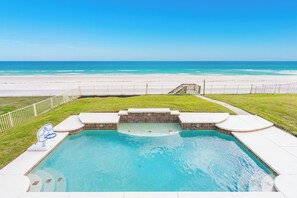 A swimming pool with a view of the beach and ocean. - Oceanfront Pool Home-No-Drive Beach-Sparkle Bay (Port Orange)