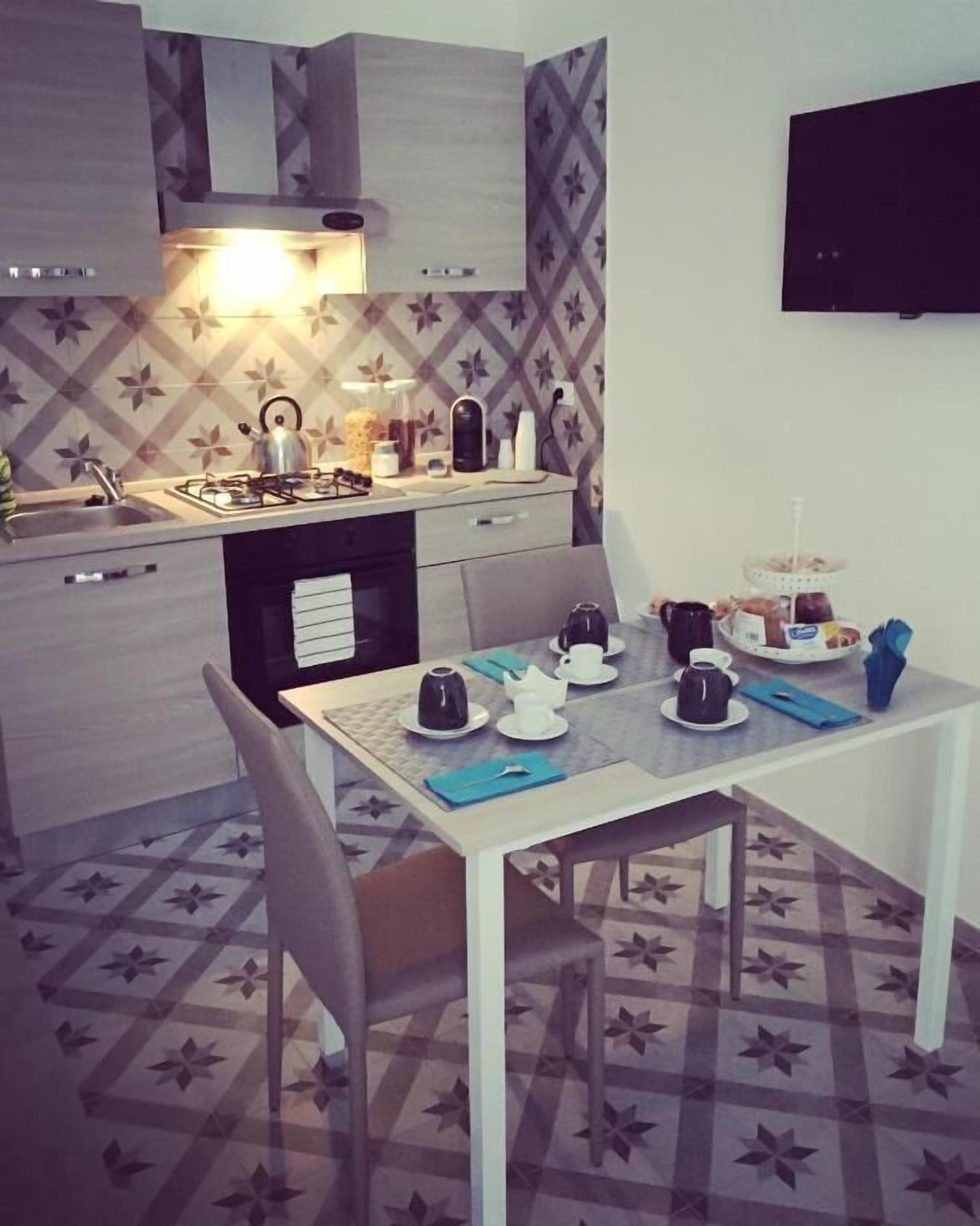 Superior-Doppelzimmer, Balkon, Stadtblick | Eigene Küche