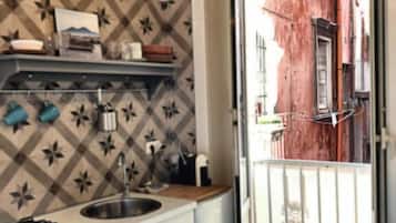 Suite monolocale Superior, balcone, vista città | Cucina privata