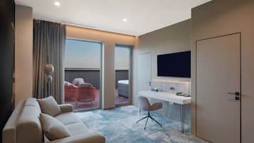 Executive Suite, 1 King Bed with Sofa bed | Living area | 125-cm Smart TV with digital channels