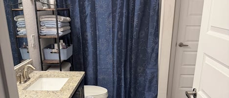 Hair dryer, towels, soap, toilet paper