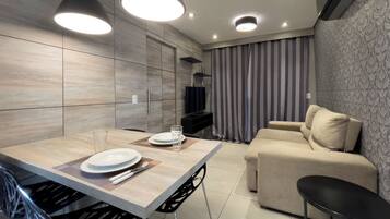 Studio | Living area | Flat-screen TV