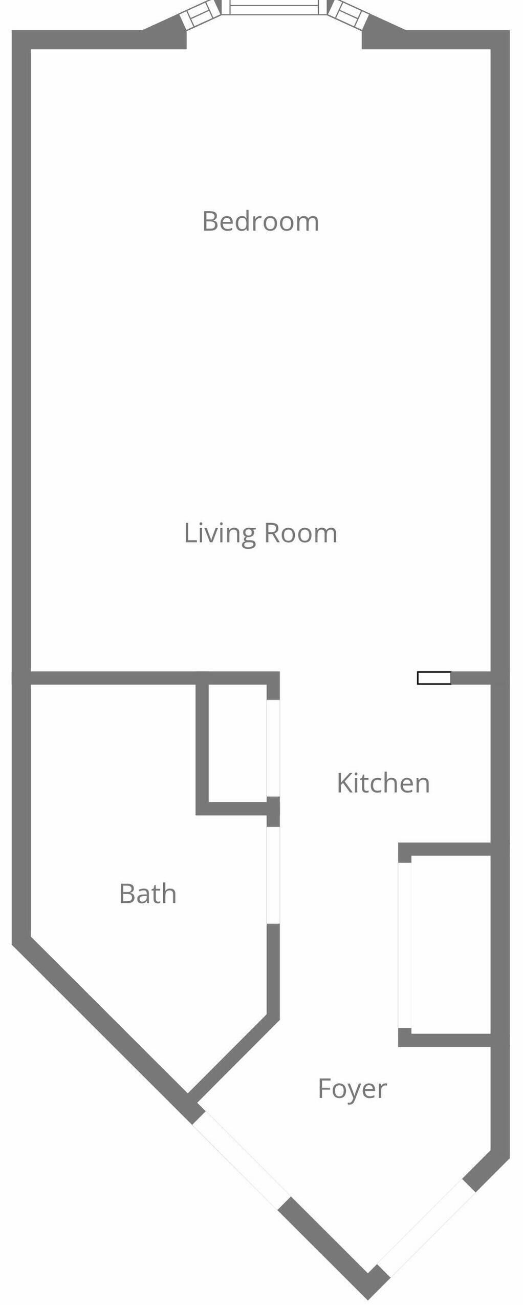 Plano de planta que muestra un dormitorio, sala de estar, cocina, baño y vestíbulo.