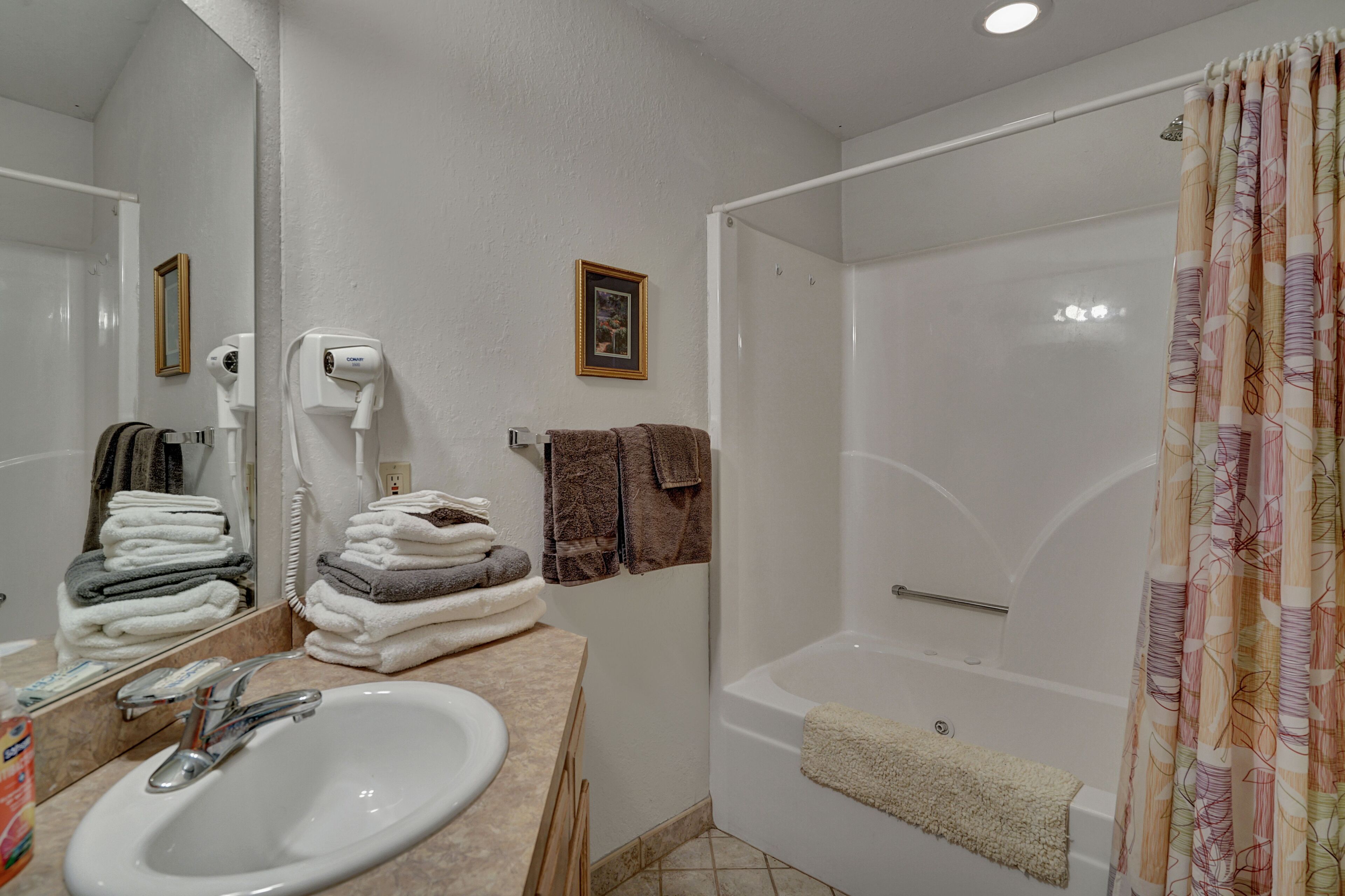 Hair dryer, towels, soap, shampoo