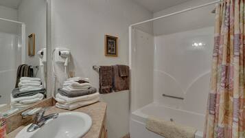 Hair dryer, towels, soap, shampoo
