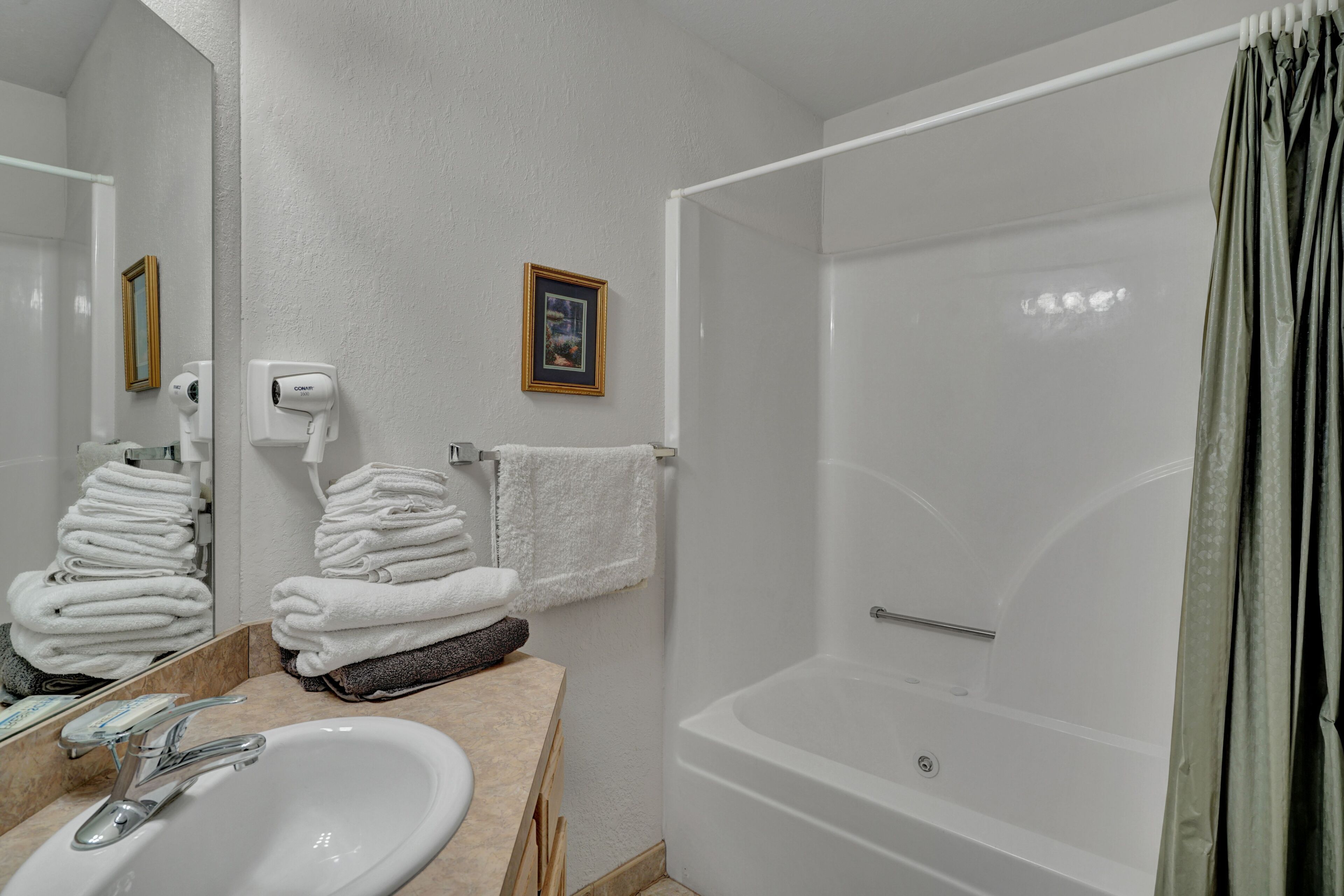 Hair dryer, towels, soap, shampoo
