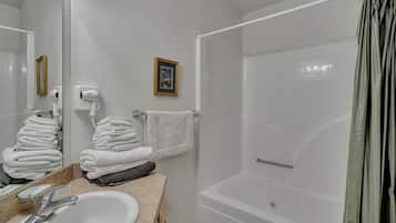 Hair dryer, towels, soap, shampoo
