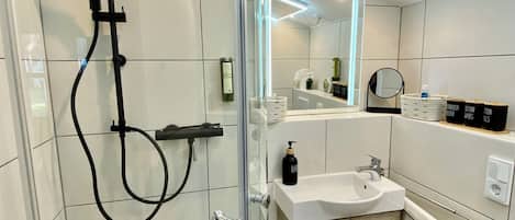 Hair dryer, towels, soap, shampoo