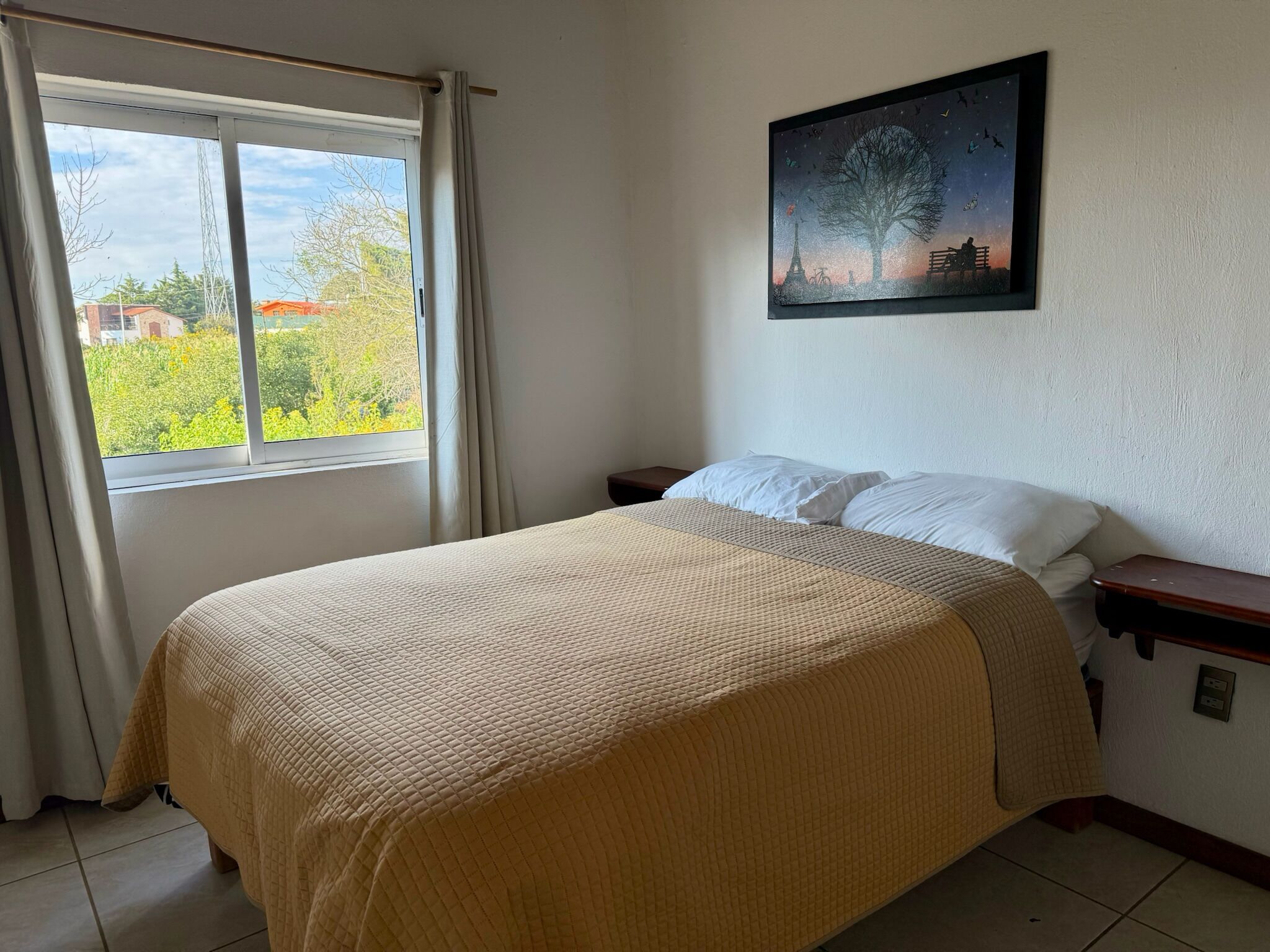 Condo superior, vista al jardín