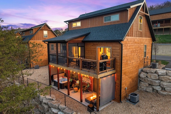 Par and Pine has two private decks to enjoy the outdoors with private hot tub, fire table, propane BBQ grill and screened in area with a smart TV.