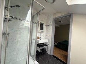 Shower, hair dryer, towels, soap