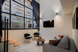 Deluxe Duplex | Living area - Hotel ARENA byAstiblanco (Valencia)