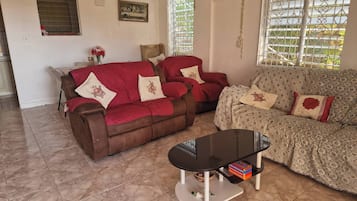 Kamer, 1 slaapkamer, roken, patio | Woonkamer