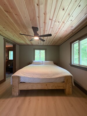 A bedroom with a wooden ceiling, a bed, and two windows. - Ski-In ⛷ & Golf with Million-Dollar Mountain Views, Quick Drive to Asheville (Mars Hill)