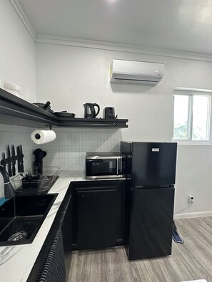 Departamento, balcón, vista parcial al mar | Cocina privada