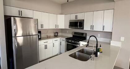 Modern Condo w separate office, two pools & gym