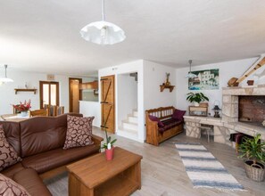 Villa (Four Bedroom Villa with Outdoor Swimm) | Living room | 32-inch flat-screen TV with cable channels