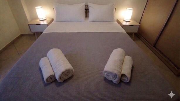 2 dormitorios, tabla de planchar con plancha, wifi y ropa de cama