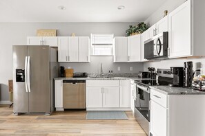 Fridge, microwave, oven, stovetop - Irvington Style | Luxurious 3BR • Prime Location (Indianapolis)