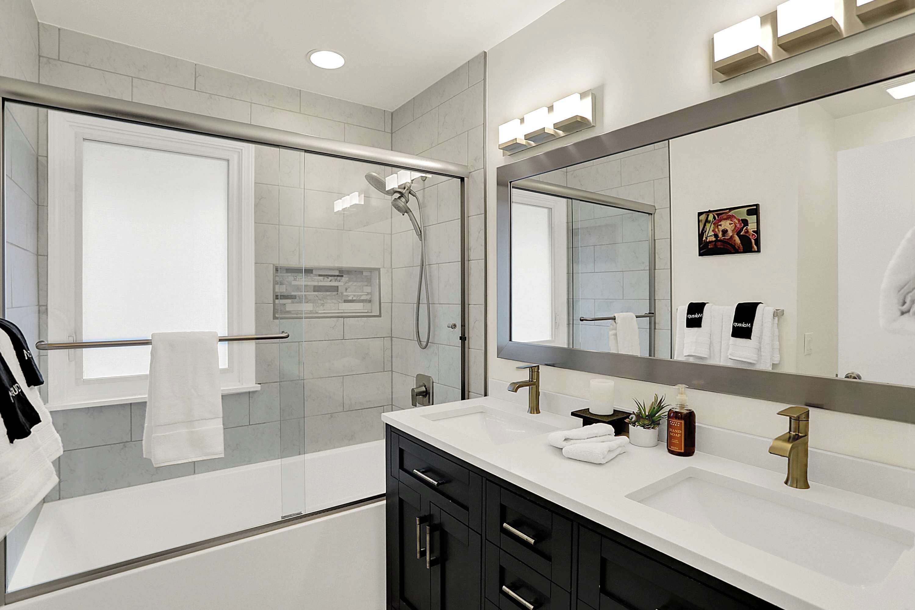 Shower, hair dryer, towels, shampoo