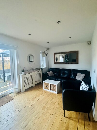 Spacious 3-Bed Home with Private Gym & Garden