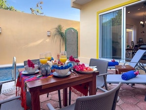 Standard Apartment, Pool View | Outdoor dining